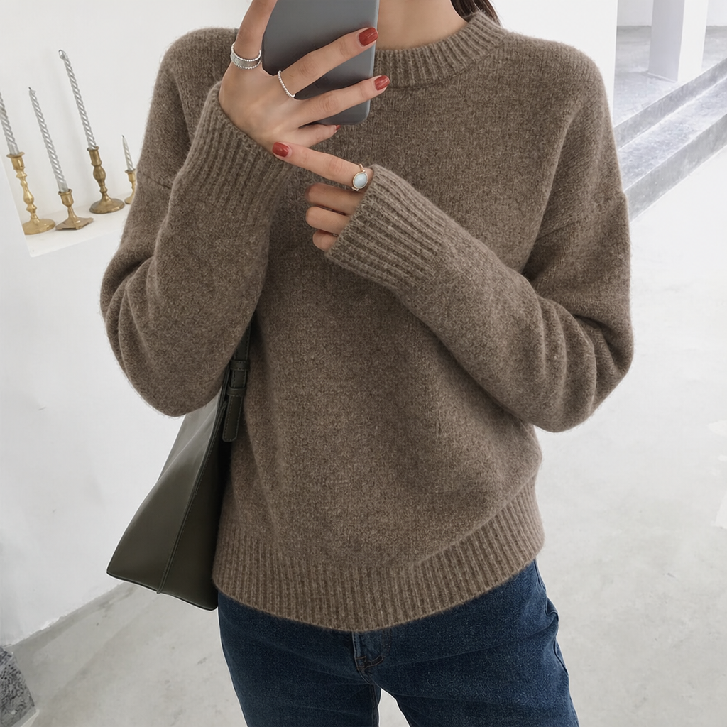 Stylish women's oversized fluffy crew neck sweater, ideal for cozy fall & winter fashion outfits.
