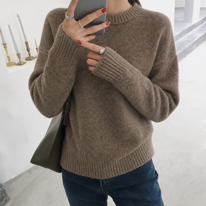 Stylish women's oversized fluffy crew neck sweater, ideal for cozy fall & winter fashion outfits.