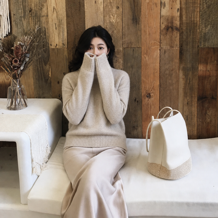 Luxurious fluffy women's oversized jumper. Classic crew neck, soft material for cozy winter fashion.