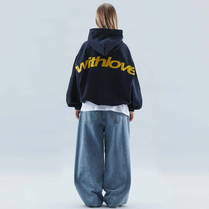 Modern women's oversized graphic hoodie, a trendy drop shoulder pullover ideal for streetwear fashion.