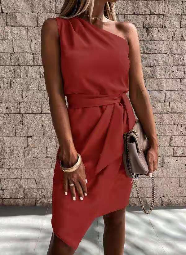 Beautiful women's one-shoulder party dress. Elegant midi length with a sophisticated tie waist. Cocktail ready.