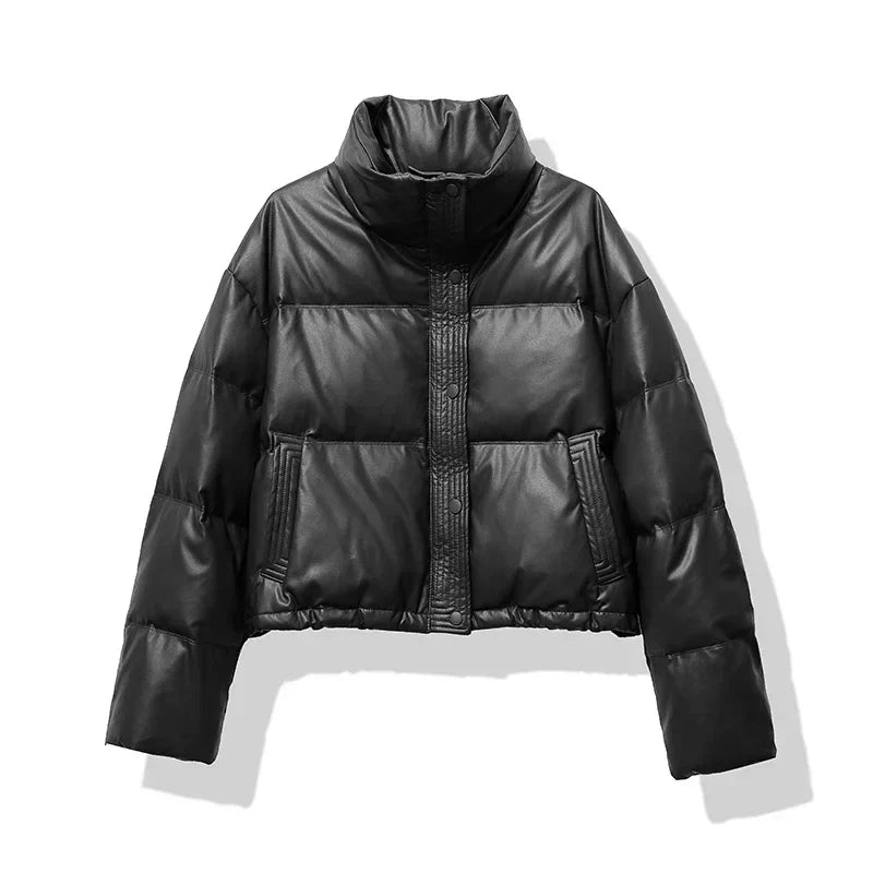 Warm women's cropped puffer jacket featuring a stand collar, perfect for stylish and cozy winter wear.