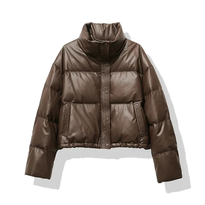 Chic women's cropped puffer jacket with stand collar, ideal for versatile winter fashion & warmth.