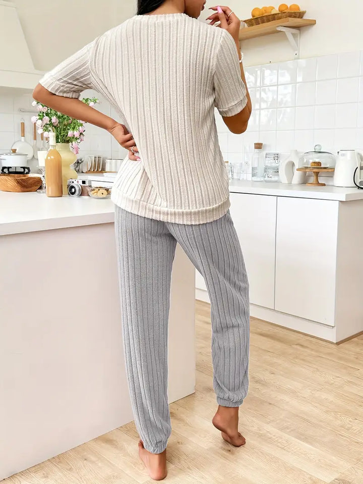 Soft women's heart print pyjama set. Comfortable two-piece loungewear, perfect for a cozy night's sleep.