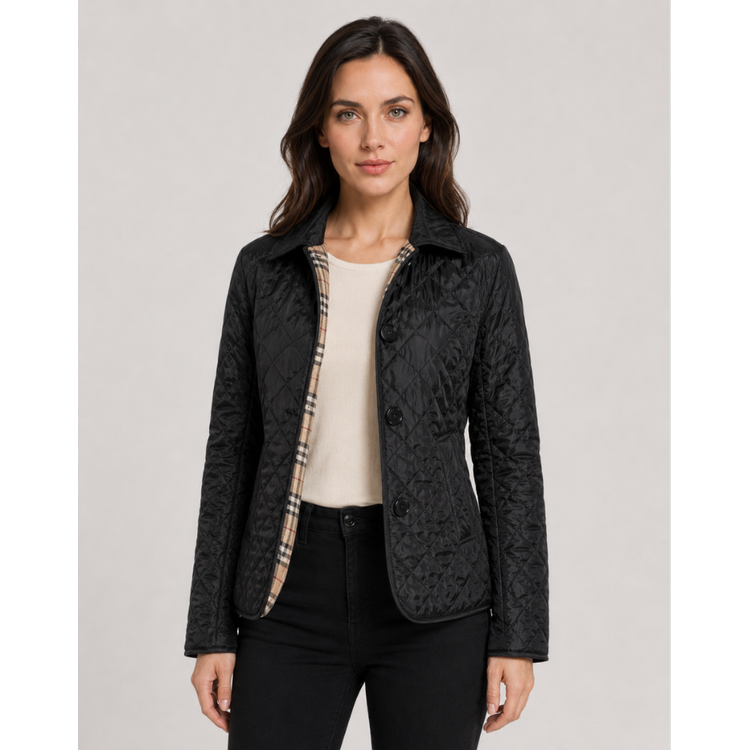 Chic women's lightweight quilted jacket with elegant diamond pattern & cozy plaid lining for transitional weather.