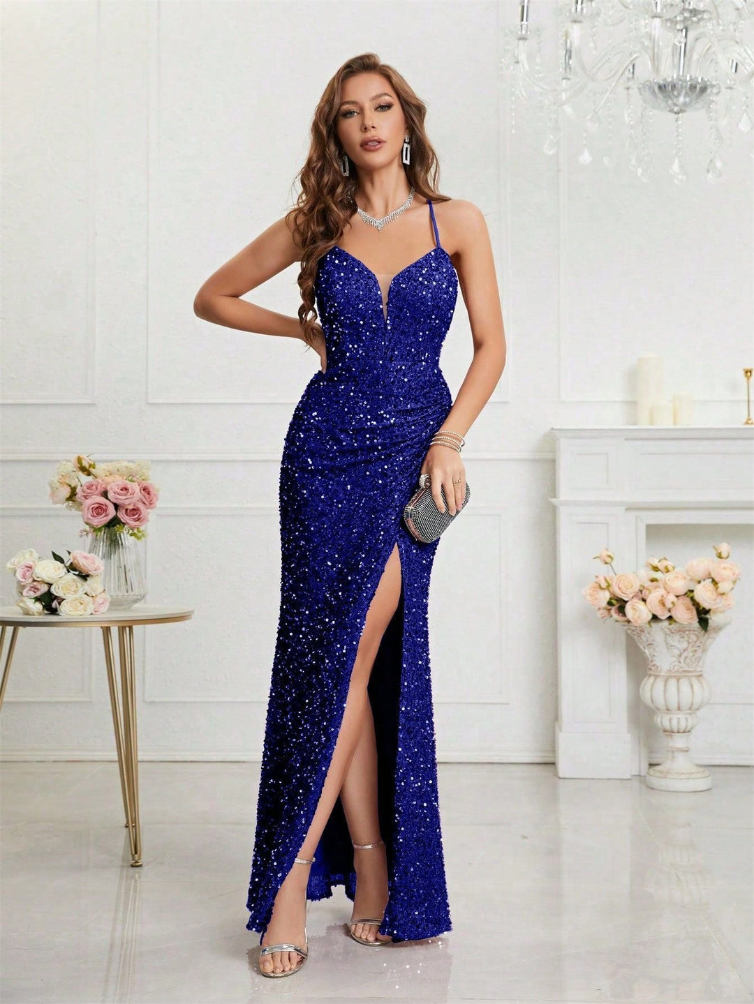 Sparkling women's sequin prom dress with a glamorous plunge V-neckline and an elegant high slit.