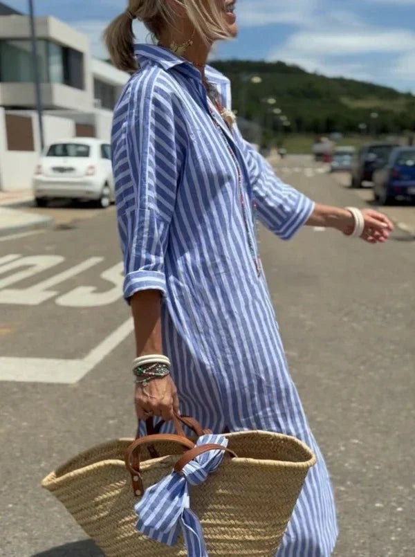 Women's striped maxi shirt dress with button-front, perfect for casual summer days or vacation style.