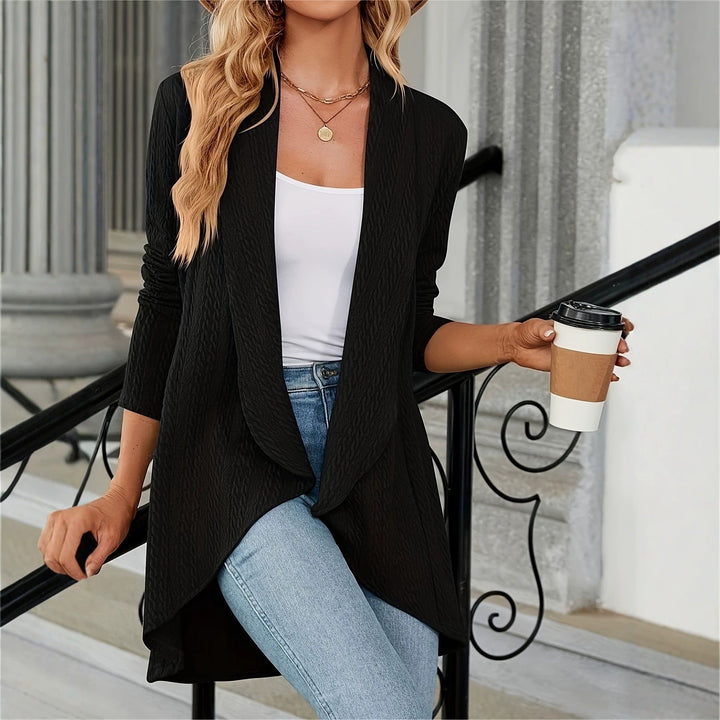 Green tailored blazer for women, draped lapel & open front. Versatile chic jacket for any occasion.