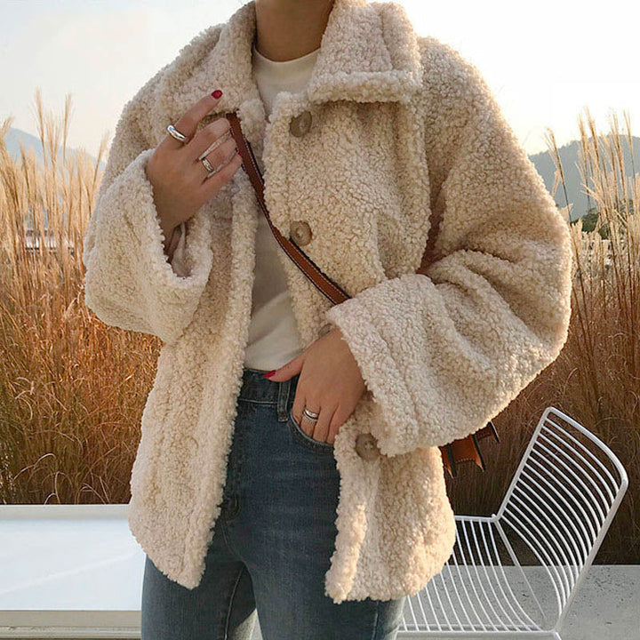 Soft women's teddy bear jacket, a stylish & comfortable fall winter outerwear option.