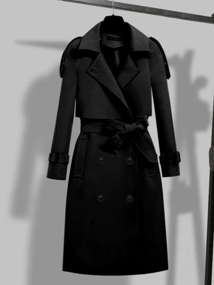 Chic women's button-front trench coat. Versatile long outerwear jacket for fall and spring fashion.