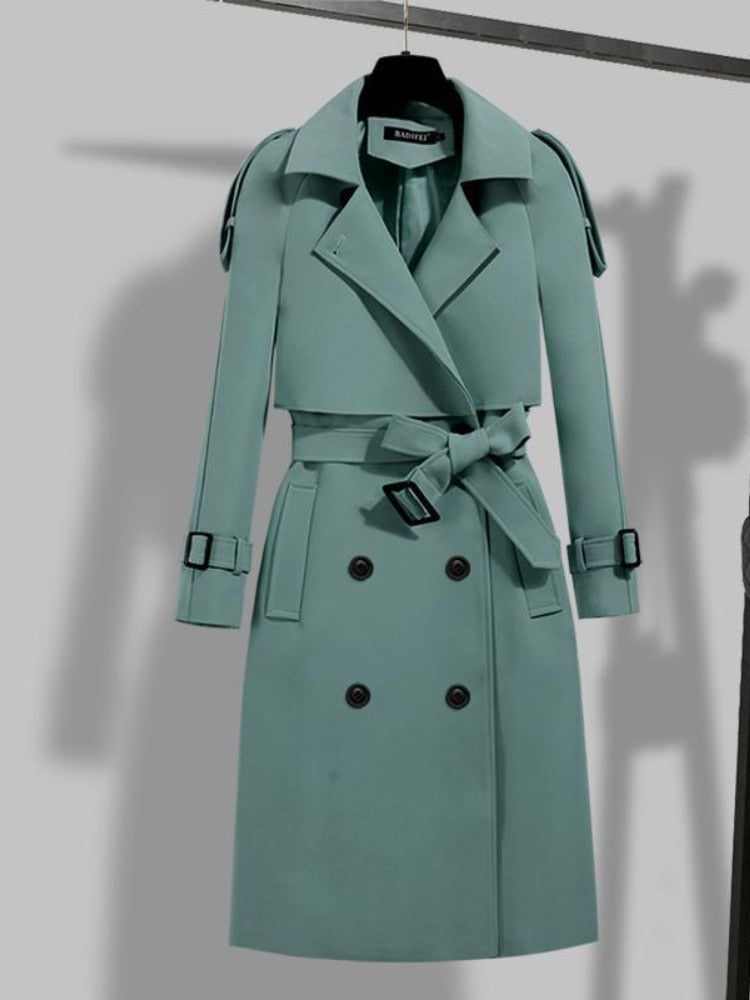 Elegant women's trench coat. A versatile classic outerwear piece for timeless spring & fall fashion.