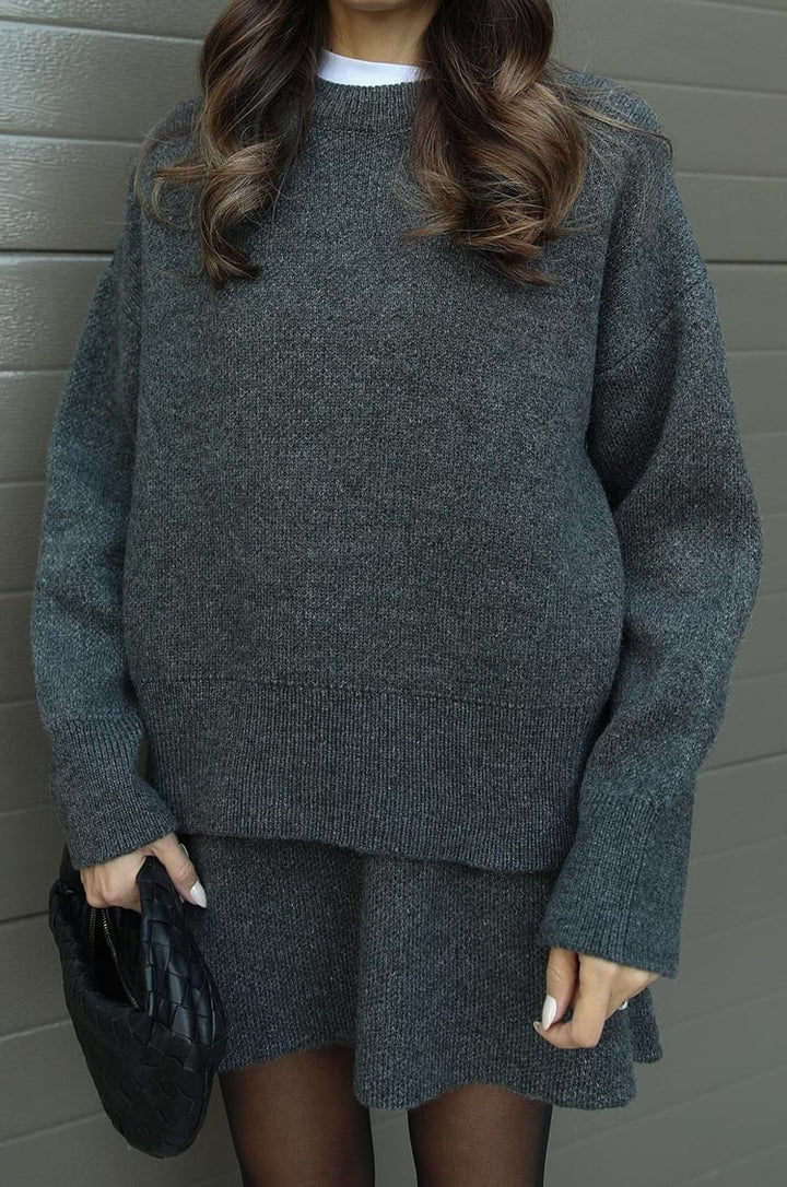 Warm & cozy women's oversized knit sweater and mini skirt set. Perfect for chilly days.