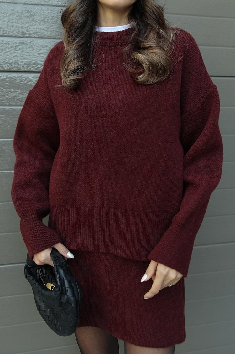 Women's fall fashion: Oversized sweater & mini skirt set. Trendy two-piece outfit.