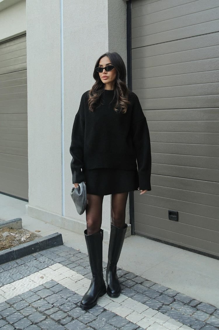 Comfortable women's two-piece set featuring an oversized sweater & knit mini skirt.