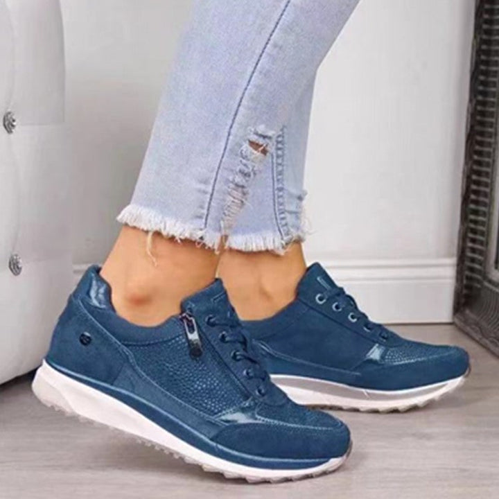 Women's wedge sneakers, lace-up casual work shoe with wide toe for comfort & style.