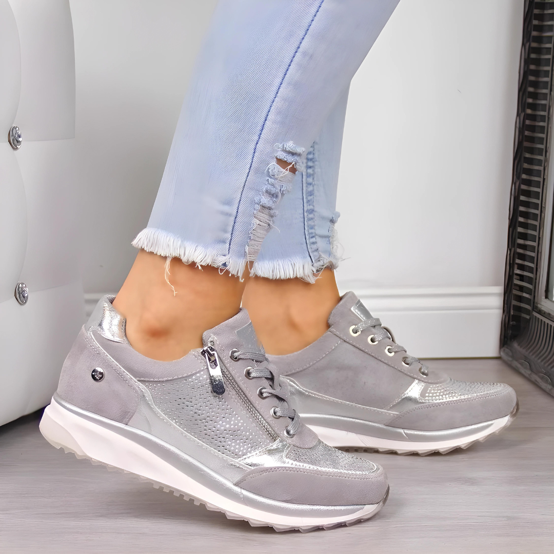 Comfortable women's wedge work sneakers, ideal for long hours, featuring wide toe & secure lace-up.