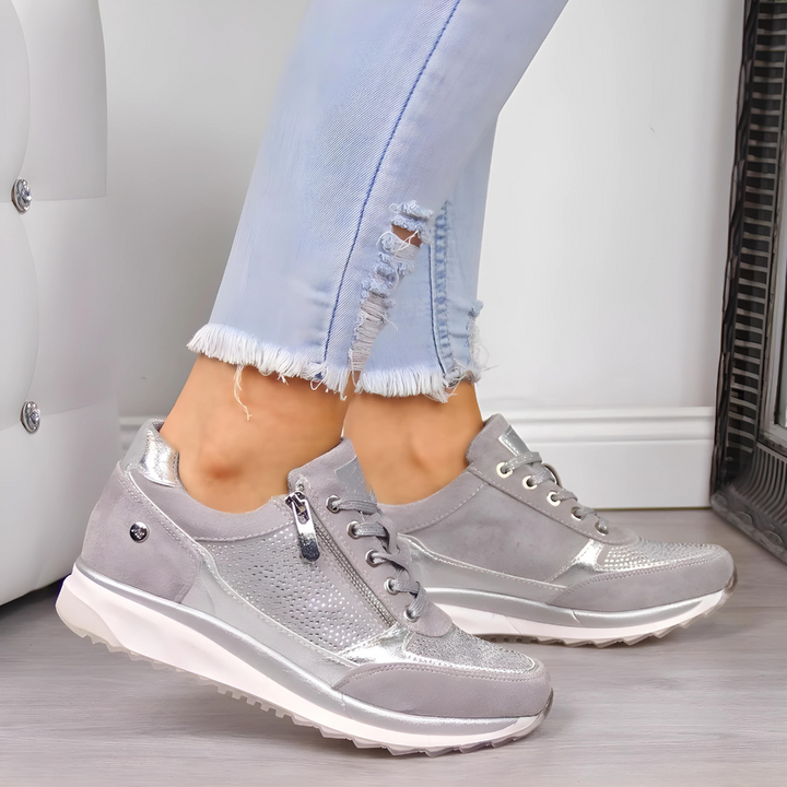 Comfortable women's wedge work sneakers, ideal for long hours, featuring wide toe & secure lace-up.
