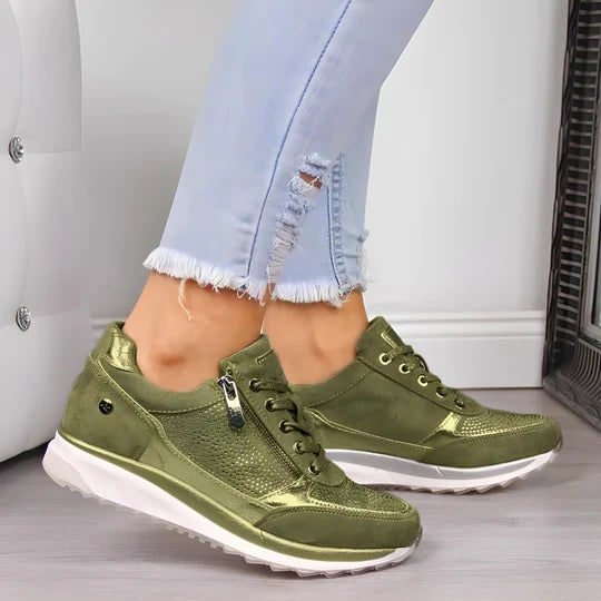 Women's stylish wedge sneakers, lace-up with wide toe, offering casual comfort & support.