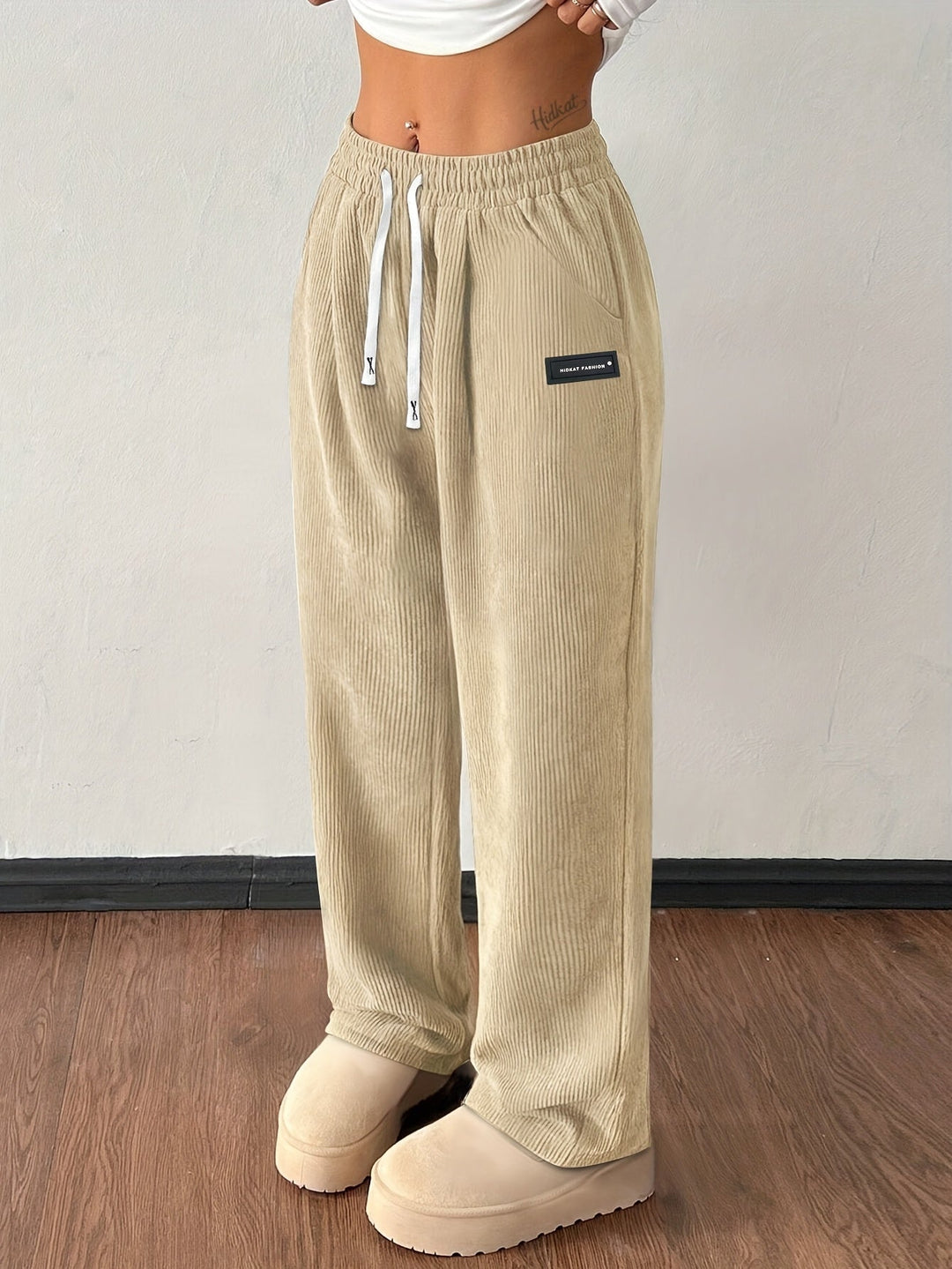 Corduroy women's wide leg pants, a baggy and textured design for casual, fashionable outfits.