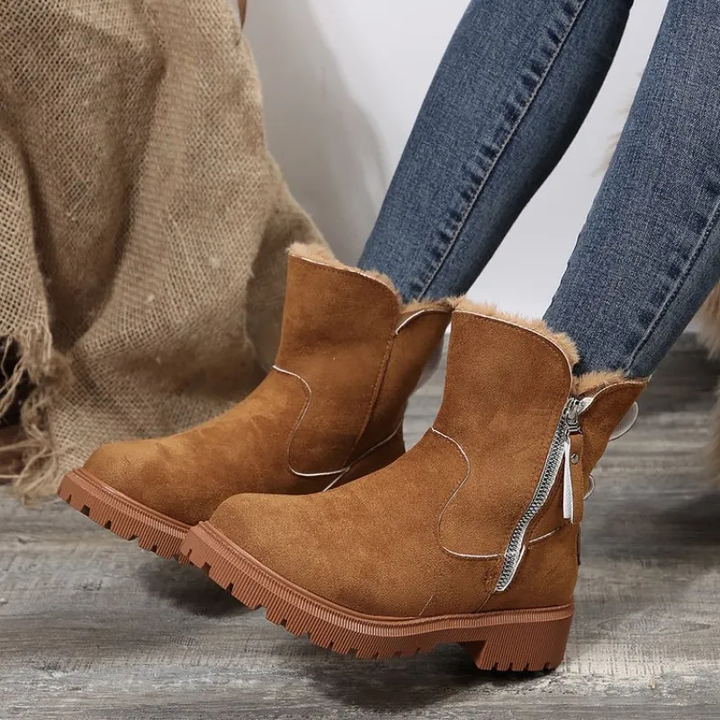 Chic women's ankle boots, warm & practical for winter. Features a secure lug sole & comfortable design.