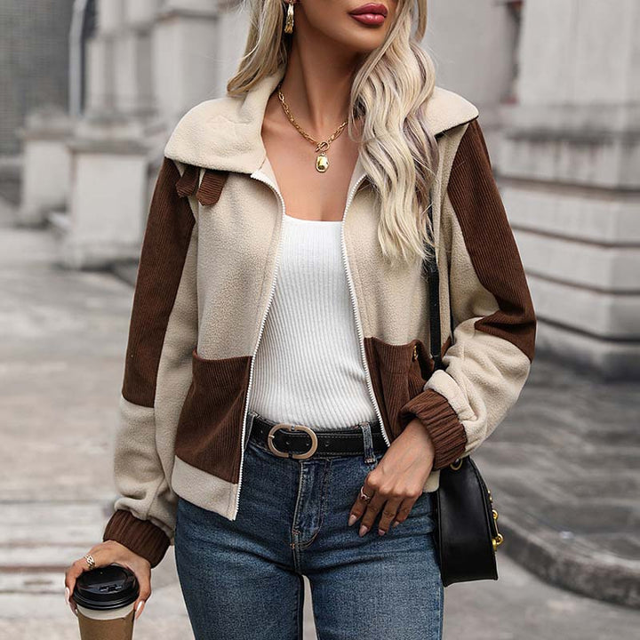 Cozy women's two-tone zip winter jacket, a warm outerwear piece with functional pockets for everyday cold weather.