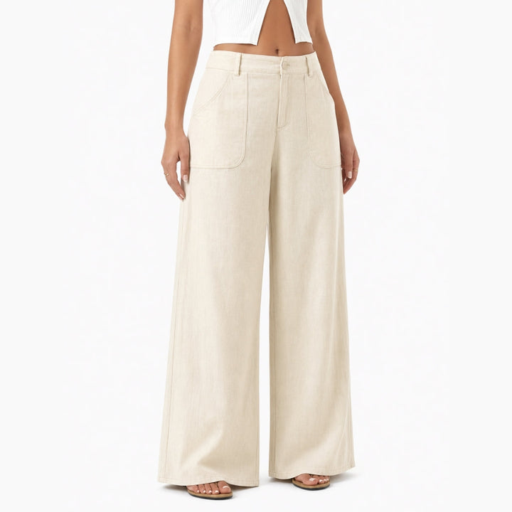 Women's high-waist wide-leg work pants, perfect for professional office wear, featuring practical side pockets.