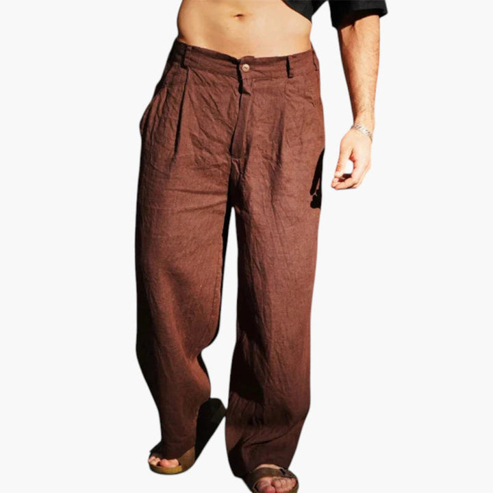 Men's chic wide-leg linen pants with pleats and drawstring waist for a relaxed, comfortable summer style.