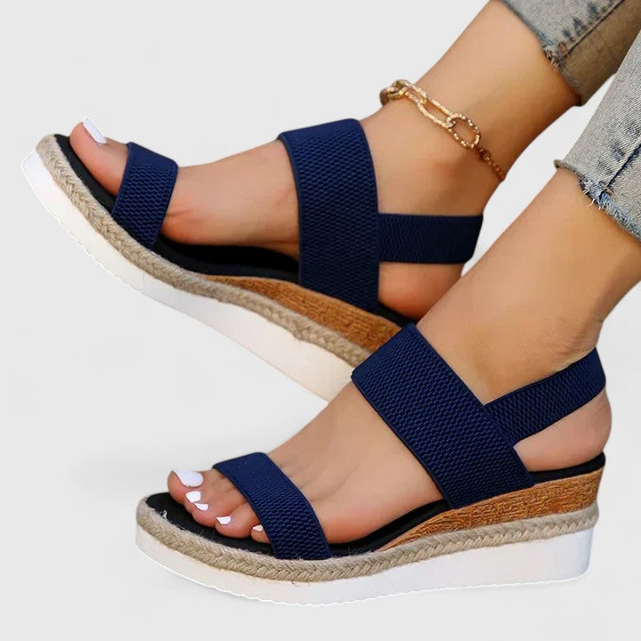 Slip-on women's comfort sandals with supportive arch and soft cushioning for daily wear.
