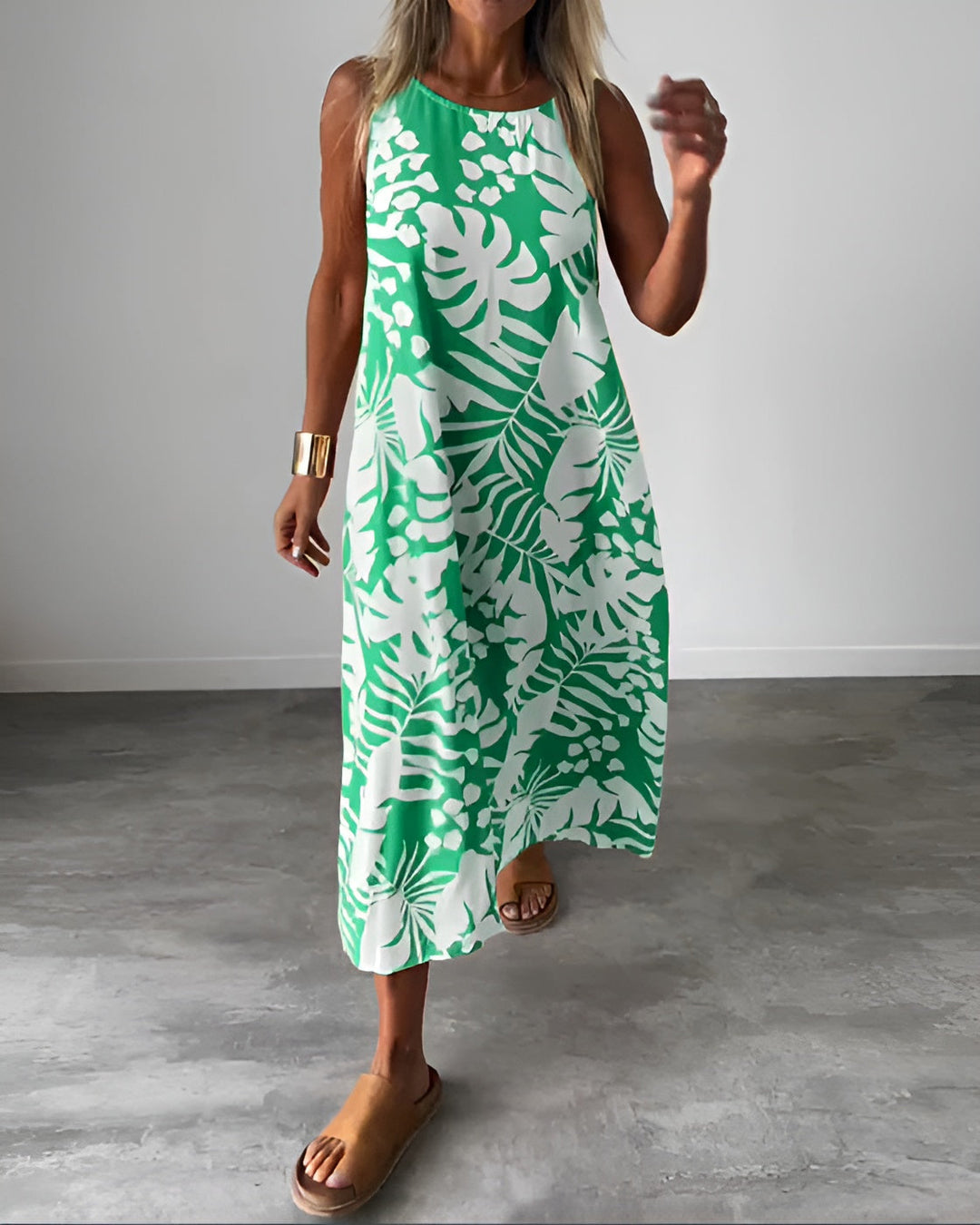 Flowy tropical print sleeveless maxi dress for women, offering comfortable summer fashion & vacation style.