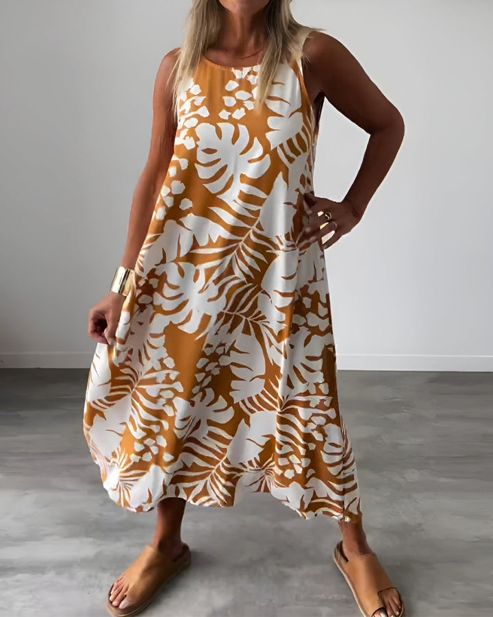 Effortless summer style: Women's tropical print sleeveless maxi dress. Casual, flowy & perfect for vacation.