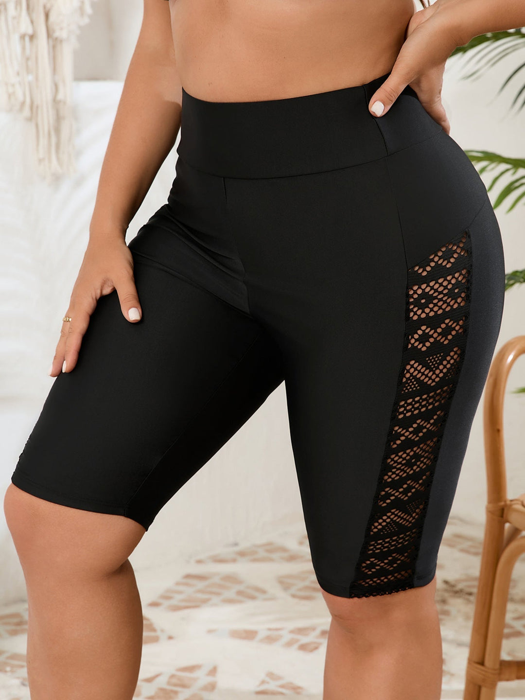 Versatile women's high-waisted bike shorts with mesh panels. Perfect activewear for any workout or sport.