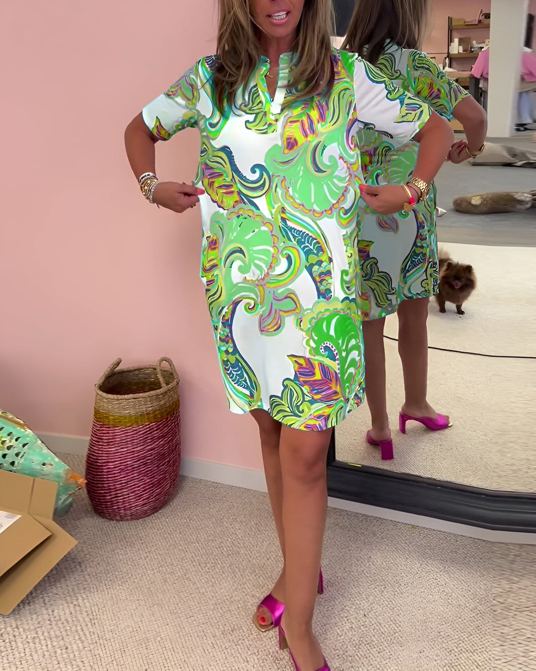 Easy wear women's shift dress with lively tropical print and short sleeves, ideal for sunny days.